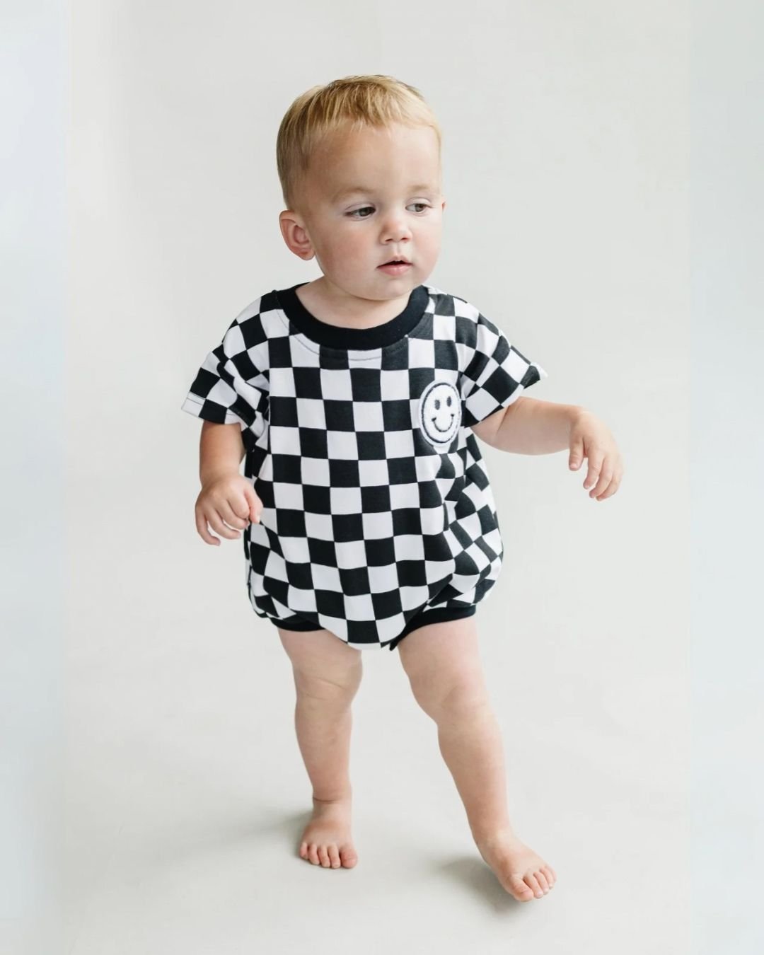 Short Sleeve Bubble Romper | Checkered Smiley Black